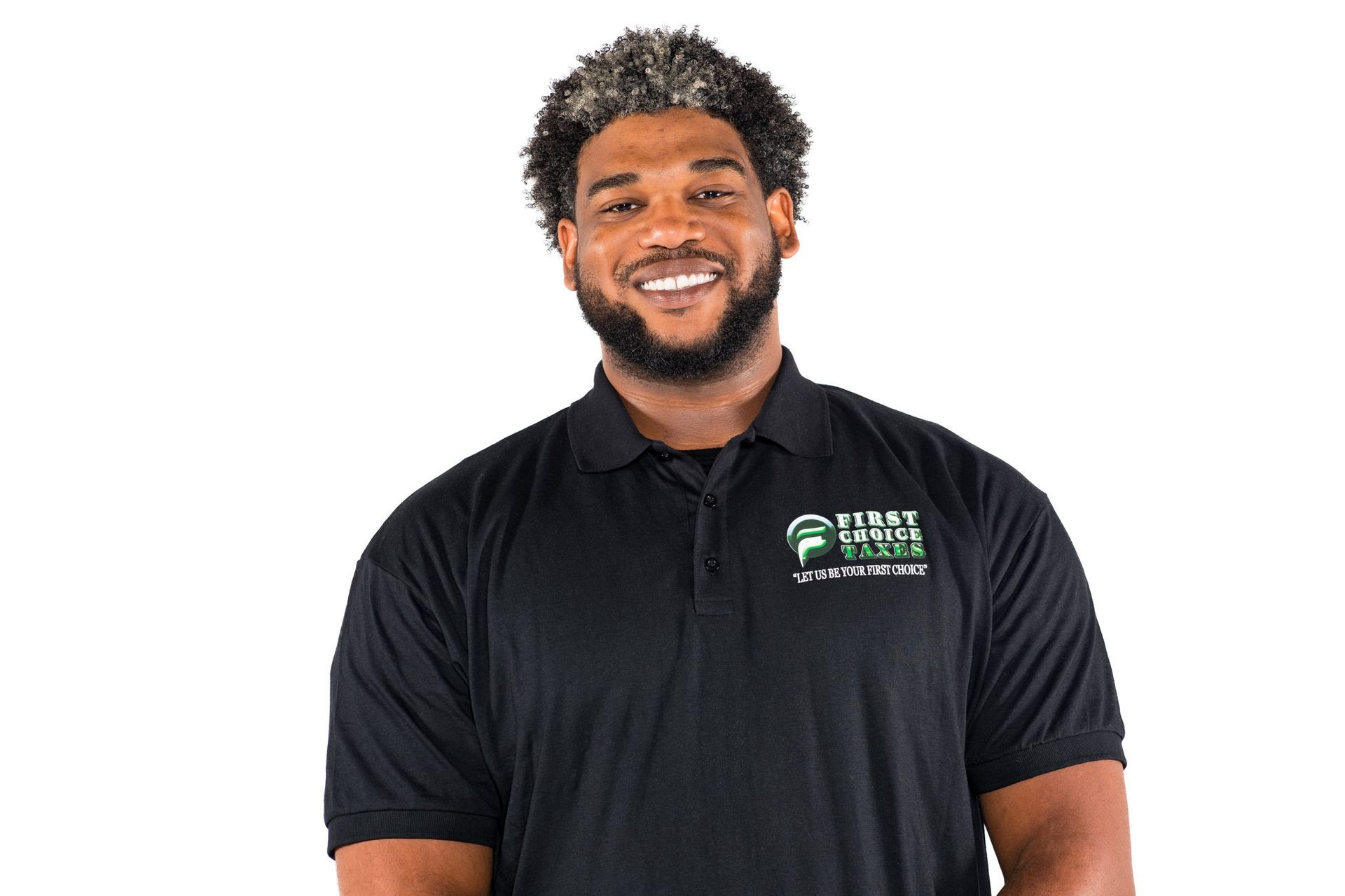 Man smiling in a black polo shirt with 'First Choice Taxes' logo on it.