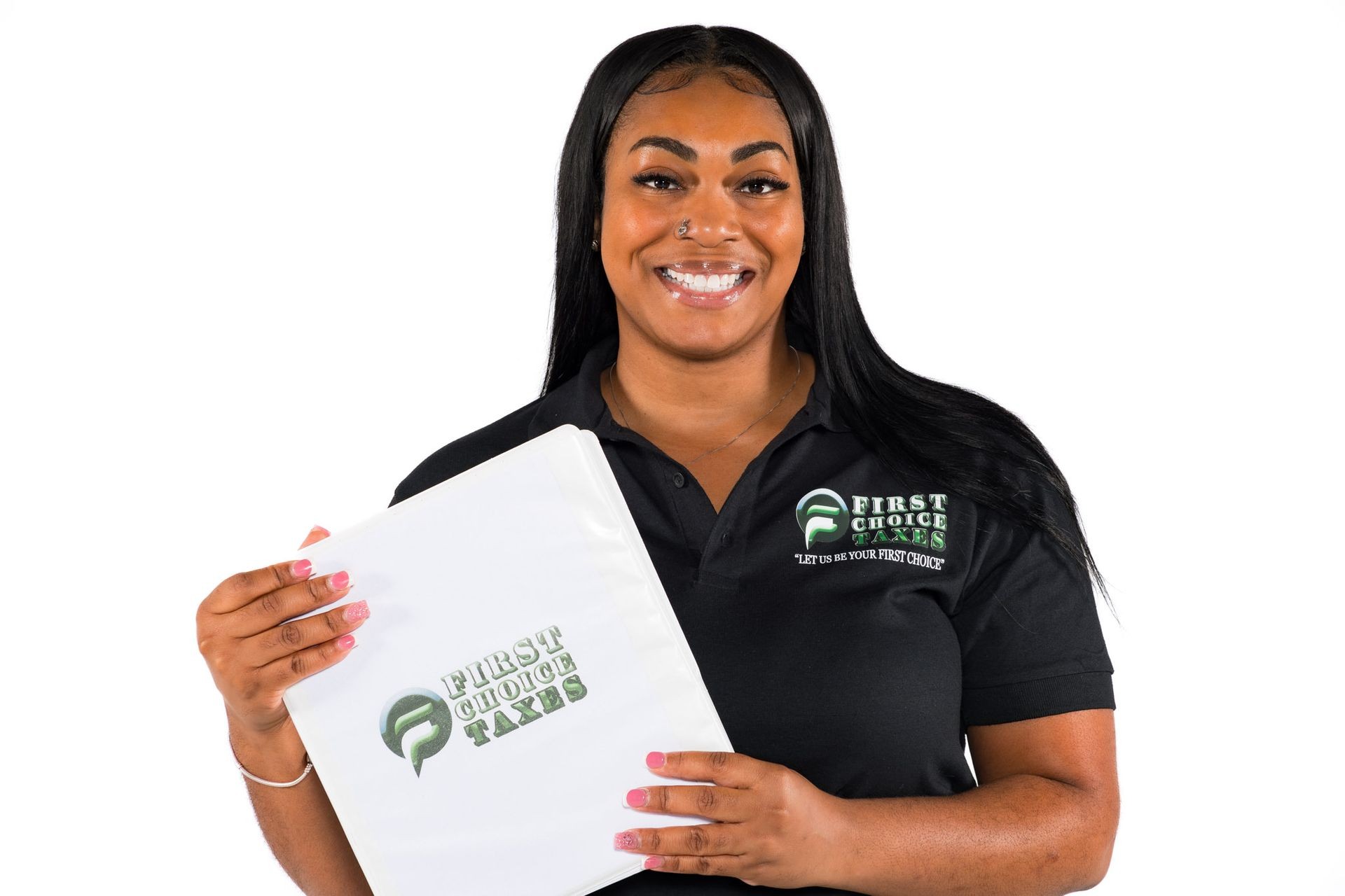 Smiling person in black polo shirt holding First Choice Taxes binder against a white background.