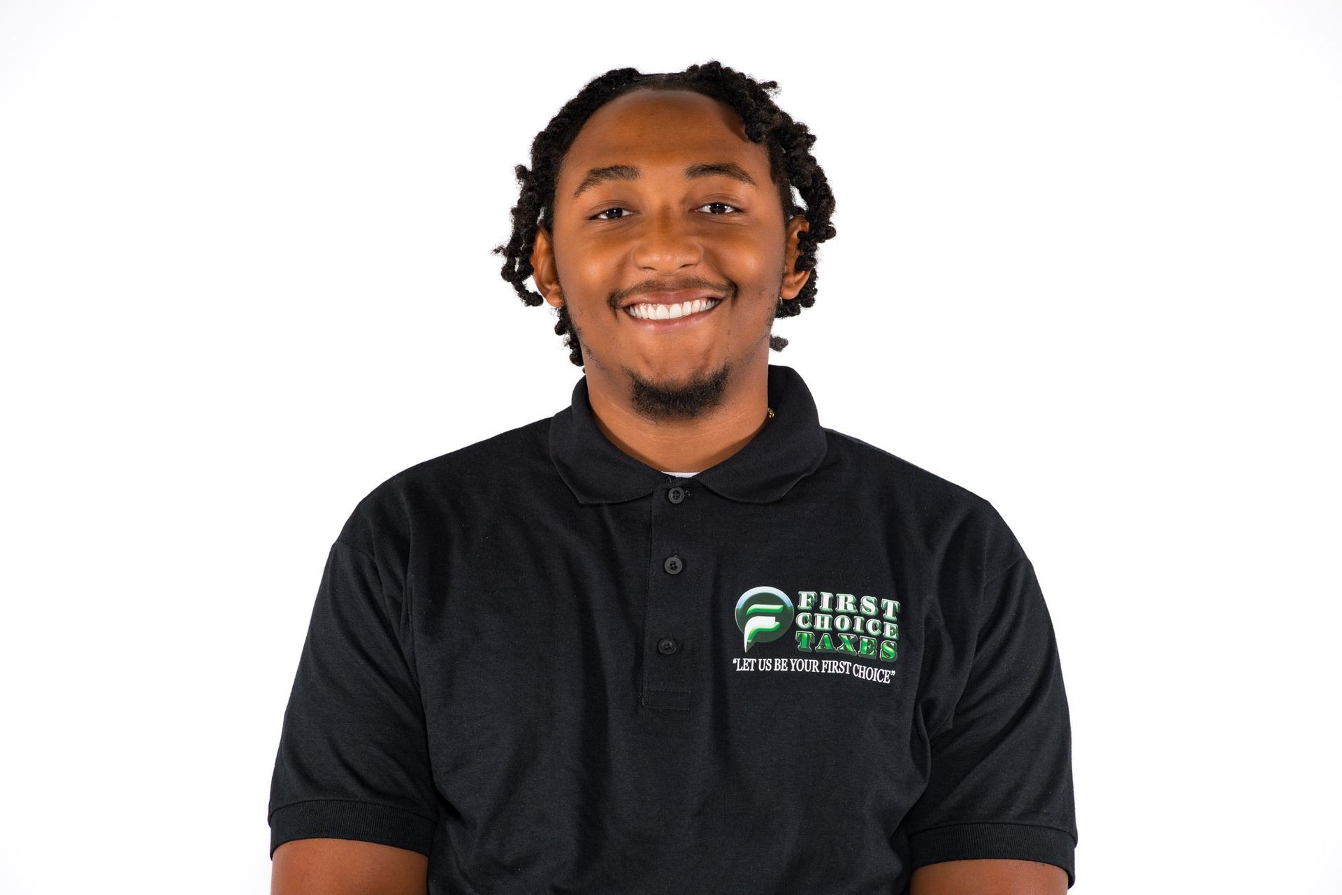 Person smiling in a 'First Choice Taxes' polo shirt against a white background.