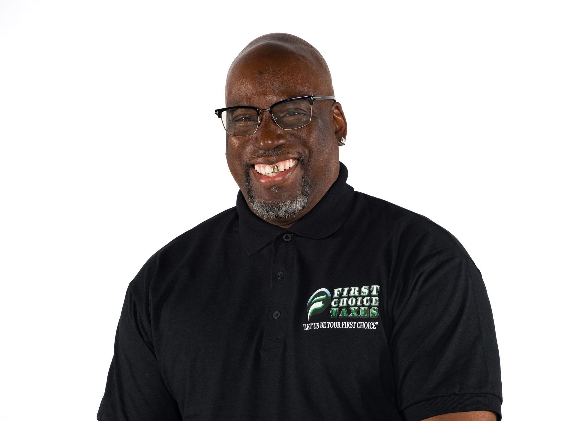 Smiling person wearing glasses and a First Choice Taxes polo shirt against a white background.